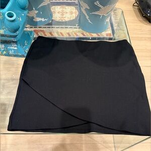 Festive Black Mini Wrap Skirt with Scallop Hem